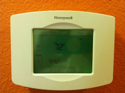 Honeywell digital thermostat on a wall